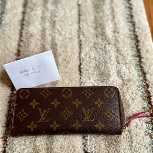 SOLD -Louis Vuitton - Clemence wallet - Fuchsia